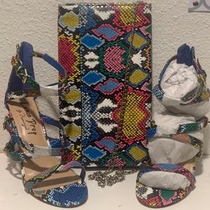 Blue snake heels and purse